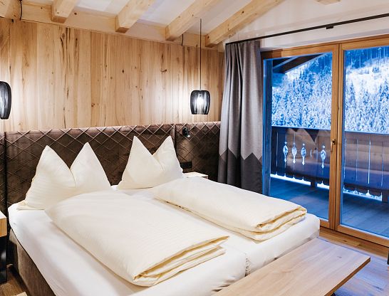 hotel-thurnerhof-saalbach-Zimmer-Familiensuite-Schwalbennest-4